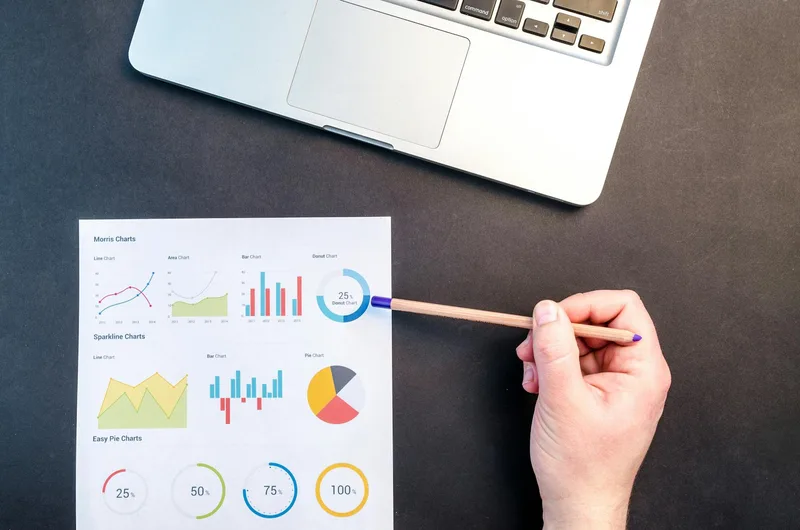 Quarterly sales report showing bar charts with business growth metrics and performance data