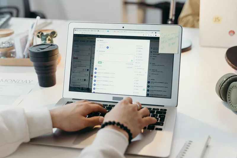 Philippine ecommerce seller setting up email automation flows on a laptop showing a visual email workflow builder with welcome sequence and abandoned cart triggers